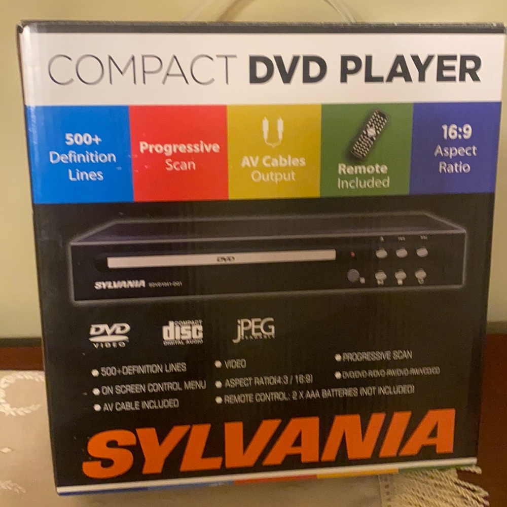 NEW IN BOX SYLVANIA DVD PLAYER WITH  REMOTE.